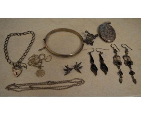 Various silver including a bangle, brooch in the shape of a frog, padlock bracelet, 3 pairs of earrings etc. Total approx wei