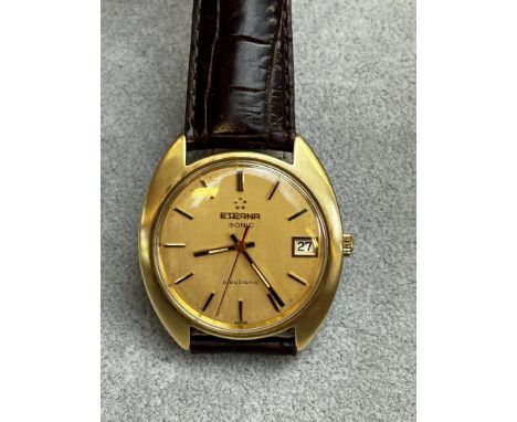 Gents gold plated Eterna sonic tunning fork watch with date 