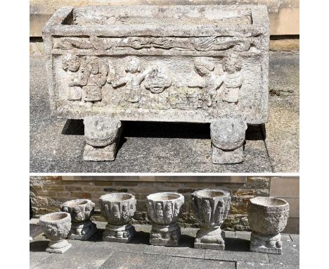 Seven Assorted Similar Composition Stone Garden Planters, modern, decorated with Apostles, comprising:one of hexagaonal shape
