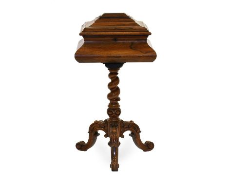 An Early Victorian Carved Rosewood Teapoy, mid 19th century, the graduated moulded hinged lid enclosing six lidded compartmen