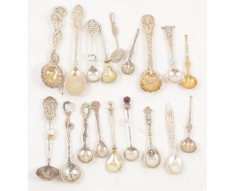 Eighteen decorative and novelty silver salt spoons, some with a Celtic design, total weight approximately 4.15oz.