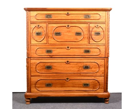 A Chinese camphor wood campaign chest, rectangular top with rounded corners, moulded edge, arrangement of seven drawers inclu