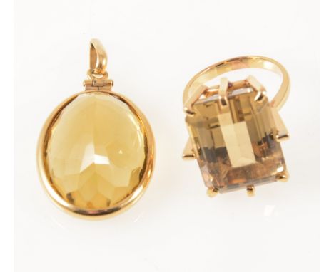 A smoky quartz dress ring and citrine pendant, the smoky quartz ring having a rectangular step cut stone 20mm x 15mm, claw se