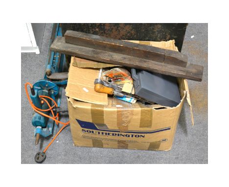 A number of hand tools, and a Black and Decker benchtop lathe, model S5F06, contained within a trunk