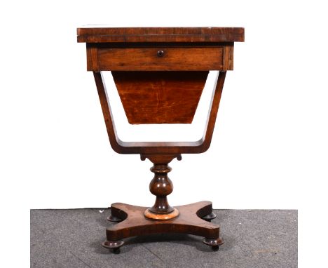 A Victorian rosewood card and work table, rectangular square edge fold over top, frieze drawer and work bag, on ‘U‘ shape bra