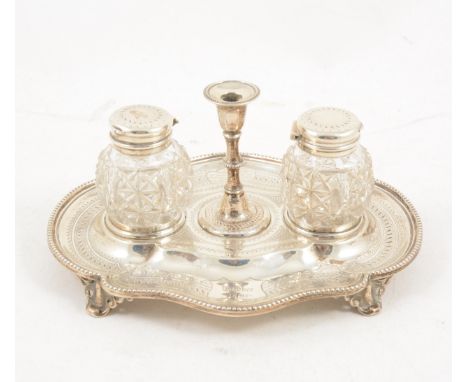 A Victorian silver two bottle inkstand by Martin, Hall &amp; Co (Richard Martin &amp; Ebenezer Hall), Sheffield 1868, the ova