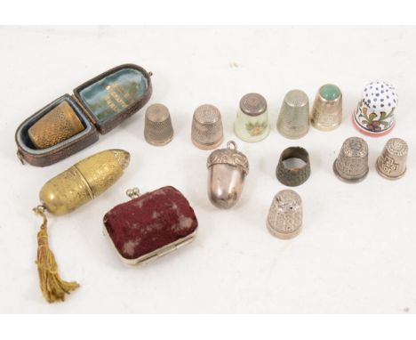 Sewing Interest - ten thimbles and four thimble cases, three silver thimbles, one enamel, six metal and one ceramic, a velvet