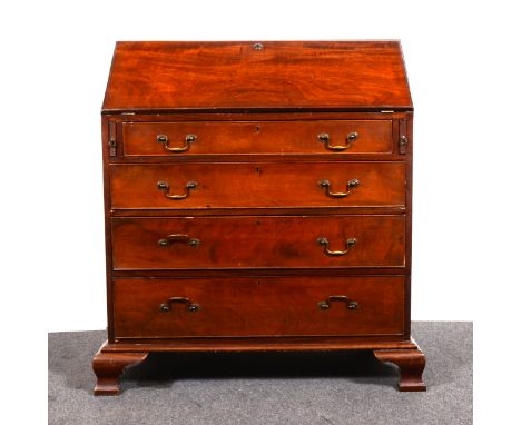 A George III mahogany bureau, fall front enclosing a fitted interior with drawers, cupboard and pigeon-holes, four long gradu