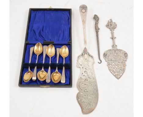 A set of six silver coffee spoons by Peter &amp; Ann Bateman, marks worn, gilt bowls, later case, a Continental white metal s