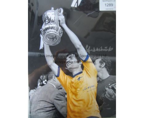 ARSENAL     Autographed col 16 x 12 photo, showing Arsenal's Charlie George celebrating after scoring the winner in the 1971 