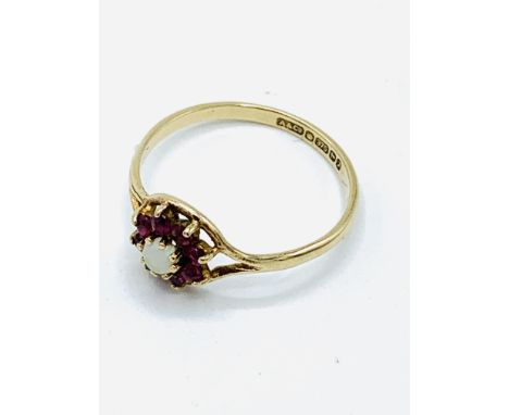 9ct gold pearl and red stone ring, weight 1.3gms, size M. Estimate £30-40.