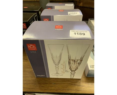 6 Melodia Crystal Champagne flutes.  This item carries VAT.  Estimate £15-20.