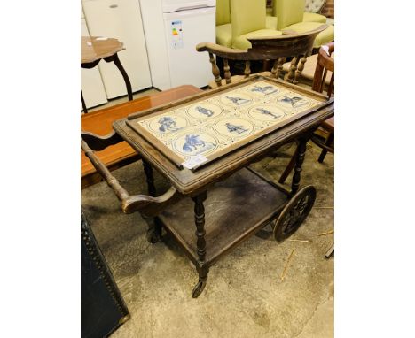 Victorian mahogany tea trolley with tile top and undershelf, 85 x 44 x 65cms. Estimate £80-100.