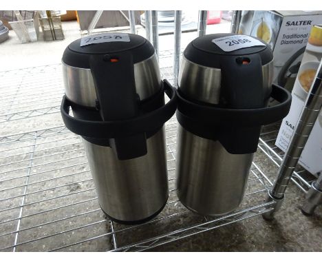 Two vacuum flasks.&nbsp; Estimate £10-12.&nbsp;&nbsp;This item carries VAT.