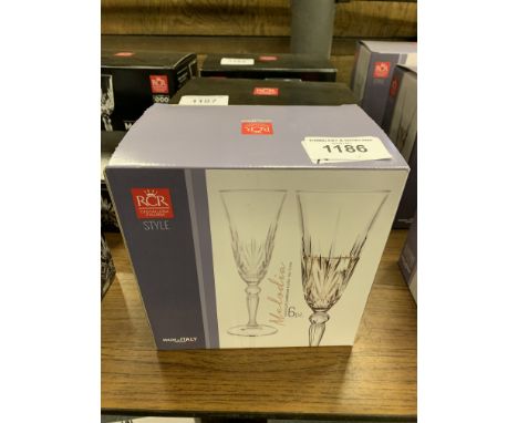 6 Melodia Crystal Champagne flutes.  This item carries VAT.  Estimate £15-20.