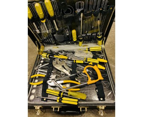 Tool box in the form of a brief case, complete with tools.  Estimate £20-30.