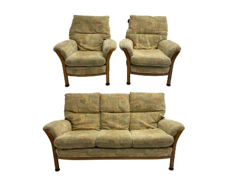 Mid-20th century beech framed three seat sofa (W1180cm) and pair of matching armchairs (W95cm) upholstered in neutral pattern