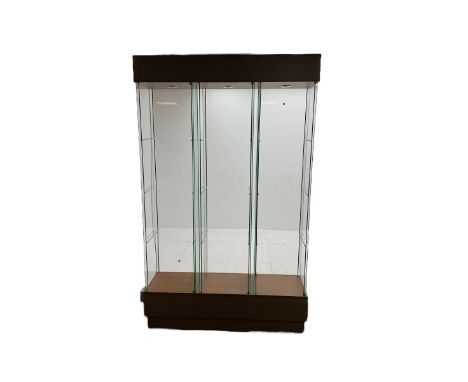 Light oak and glass open triple display cabinet, glazed back and sides with three divisions, light fitting to top of each sec