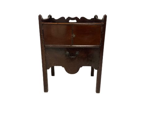 George III mahogany tray top night-cabinet commode, the three quarter gallery with pierced handle back, the rectangular slidi