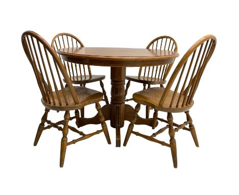 Oval extending dining table, raised on turned pedestal with quadrupod base, with additional leaf (W108cm H73cm); and set four