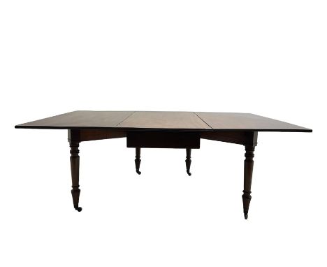 19th century mahogany gate leg dining table, rectangular drop-leaf top, raised on turned supports with brass castorsDimension