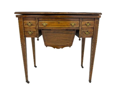 Edwardian inlaid mahogany games or work table, rectangular fold-over top inlaid with stylised dragon ivorine decoration and s