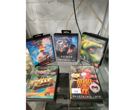 Shelf of Sega mega drive games . 