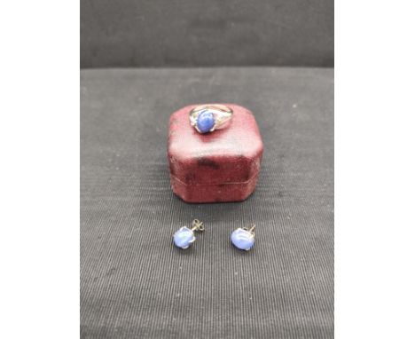 14kt hall marked ring with stones togethernwith matching earrings. 