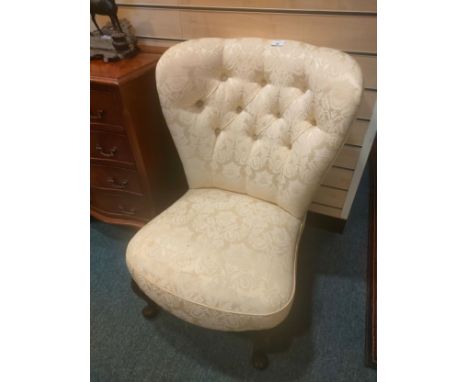Ornate button back silk spoon back style chair. 