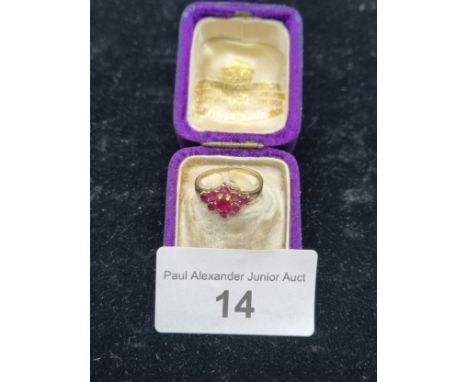 9ct gold ruby set ring . 