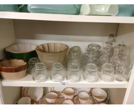 Shelf of vintage glass ware , jelly moulds etc. 