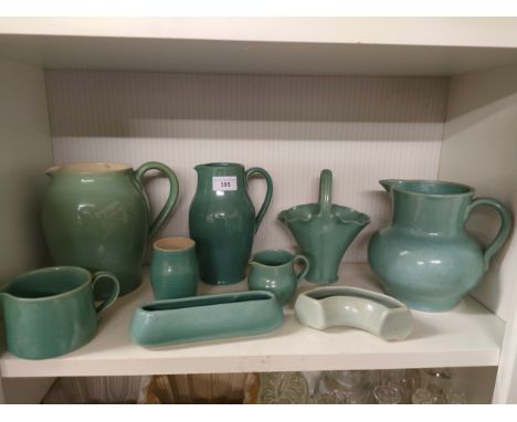 Shelf of Buchan pottery jugs etc . 