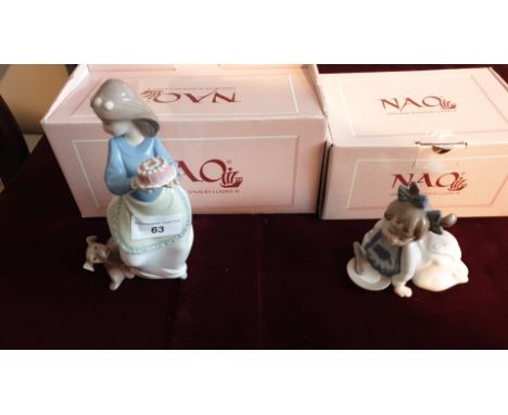 2 boxed Nao figures  . 