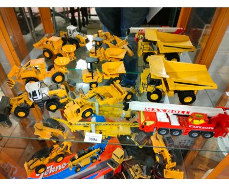 Shelf of CAT vehicles includes dumpers etc . 