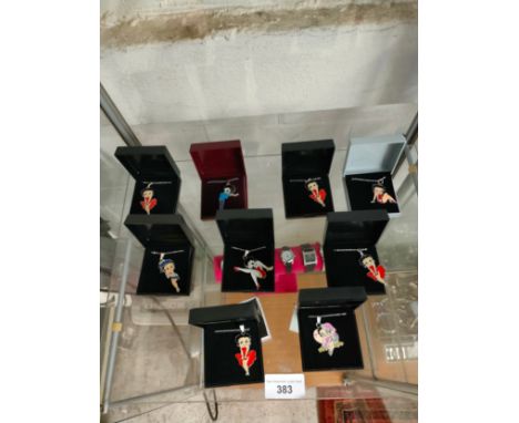 Shelf of Betty boop necklaces . 