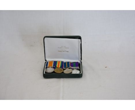 Two First World War medals presented to 1854 DVR.A.Cox R.E together with two spare ribbons.  A King George VI General Service