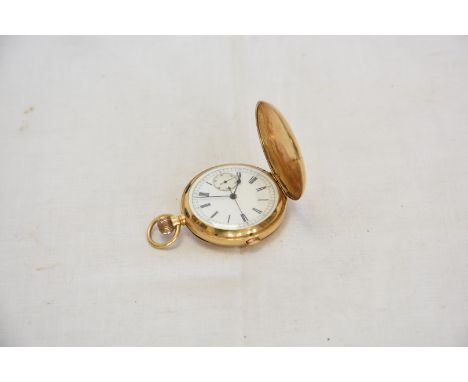 An 18ct gold cased hunter pocket watch, the exterior case with monogram, the enamelled dial with Roman numerals, subsidiary s