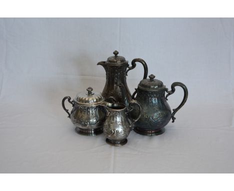 A French four piece silver plated tea and coffee set comprising coffee pot, teapot, twin handled sugar bowl and cover and mil