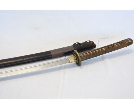 A second world war katana with shagreen handle, leather scabbard and floral decorated guard.  (scabbard af).  