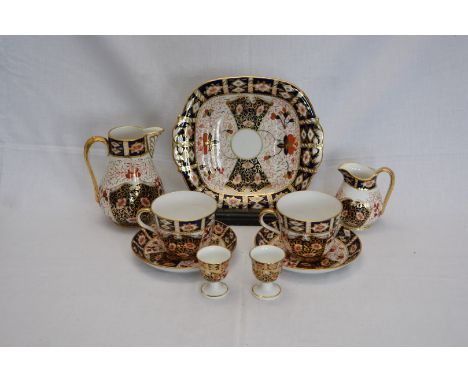 A Davenport Imari pattern breakfast service comprising twelve teacups, ten saucers, twelve side plates, an oval plate, two sa