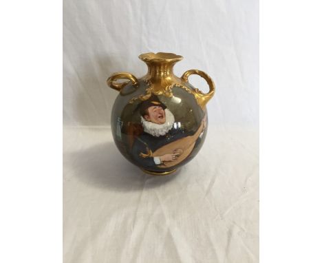 A Royal Doulton twin handled vase decorated with a figure playing a lute by H Tittersall with green underglaze mark.  6ins hi