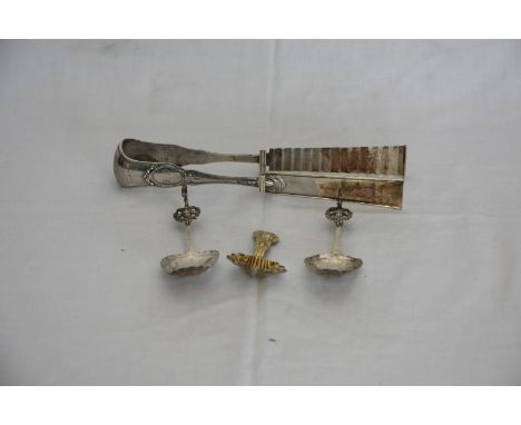 A set of French silver plated asparagus servers with monogrammed handles and ridged tong ends, a continental white metal cadd