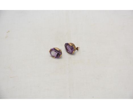 A pair of 9ct gold amethyst set earrings.  
