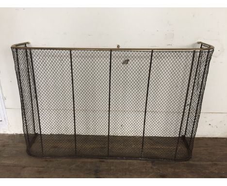 A brass and mesh firescreen.  48ins wide. 
