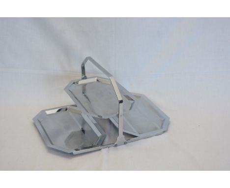 An Art Deco style folding tray formed from three octagonal engine turned panels.  