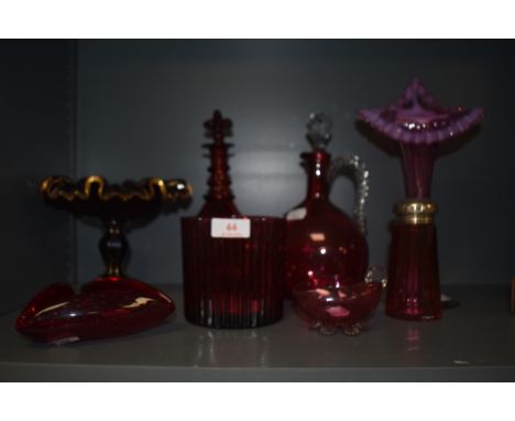 A mixed lot of vintage ruby and cranberry glass ware, Jack in the Pulpit vaseline, early 20th century sugar sifter, fluted va