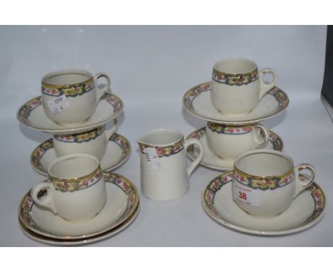 A group of LNER interest, Alfred Meakin hotel ware, comprising six cups, seven saucers and milk jug, 1933 'kesick, LNER' to u