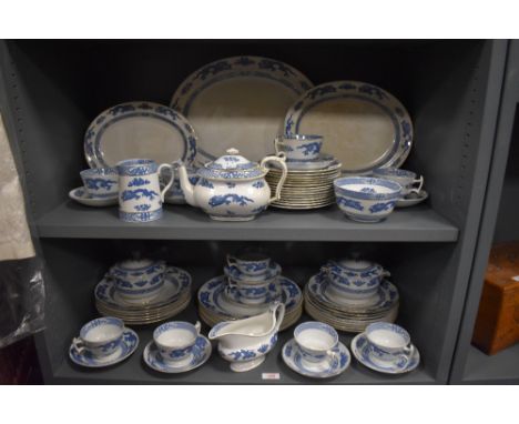 A large collection of Booths china, having oriental transfer pattern in blue on white ground, platters, plates, cups and sauc