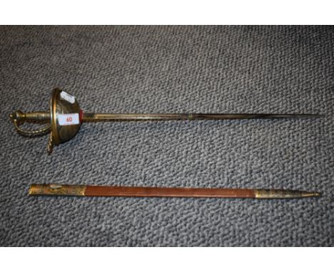 A decorative Spanish ceremonial sword having leather scabbard, marked Toledo to balde.