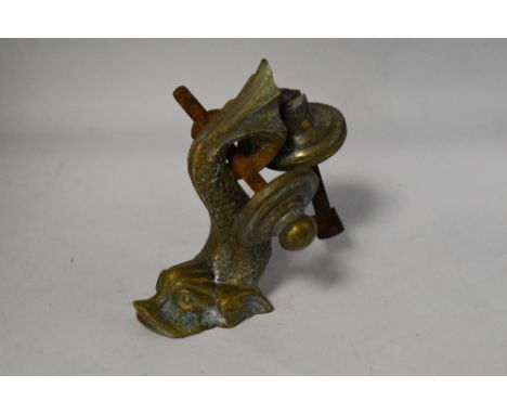 A vintage cast brass sea creature door knocker.
approx 12cm high by 4cm widest point.